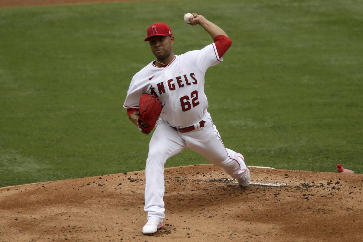 Angels starting pitcher Jose Quintana delivers during the first inning of Sunday's 2-1 win over the Dodgers.