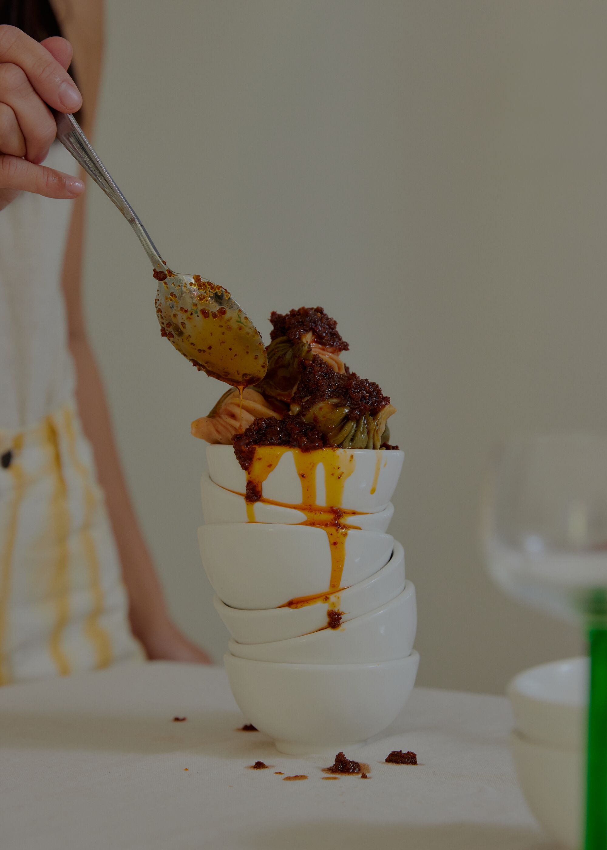 Sandy Ho tops off a bowl of dumplings with her shallot and garlic chili oil.