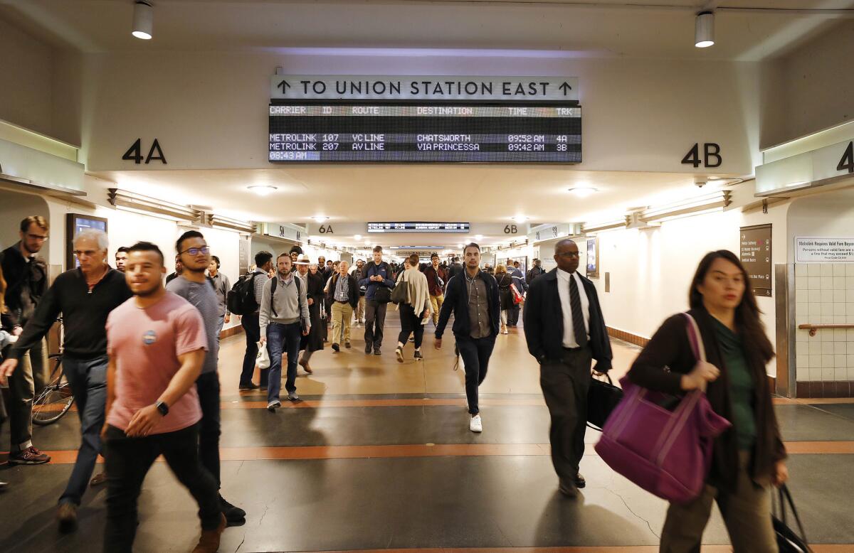 Passengers file off from the train platforms at Los Angeles Union Station. (Al Seib / Los Angeles Times)
