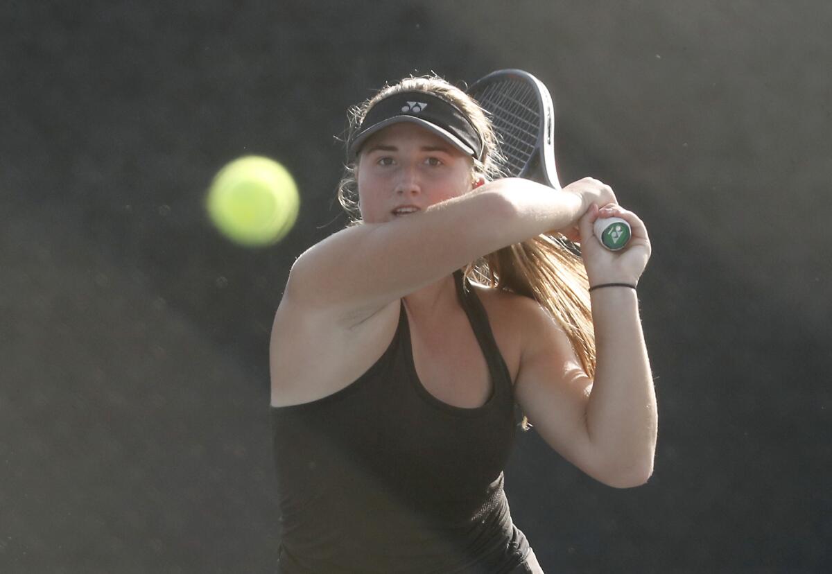 Huntington Beach's Kaytlin Taylor competes in a singles set against Corona del Mar's Olivia Sipiora in the semifinals of the CIF Southern Section Division 1 playoffs on Wednesday.