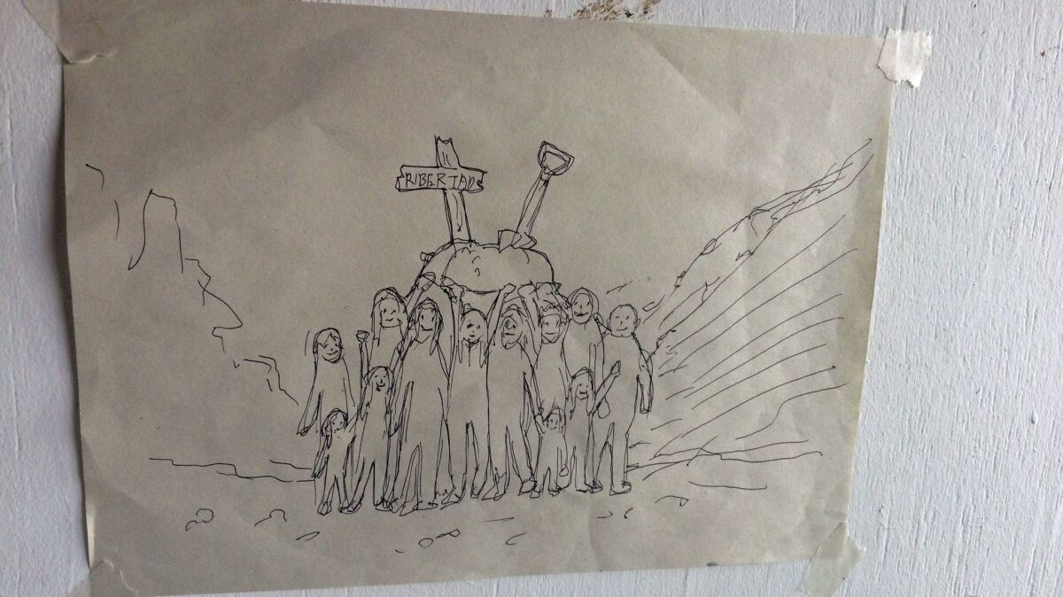 A drawing inside the treehouse depicts the procession of children who carried a symbolic grave bearing the words "Libertad."