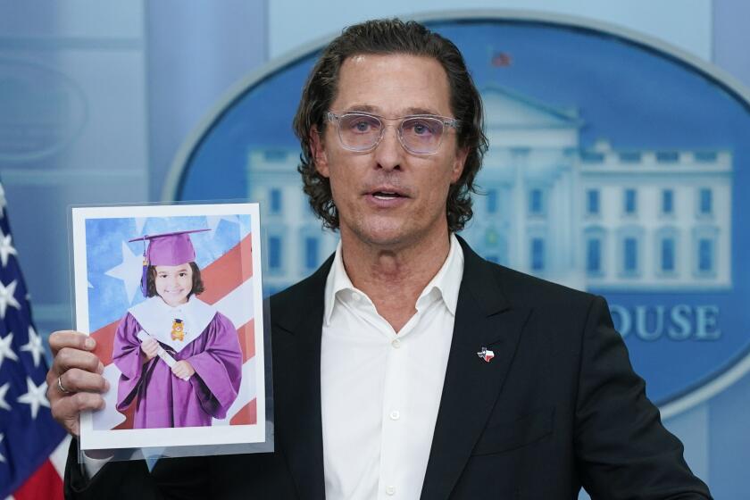 Actor Matthew McConaughey holds a picture or Alithia Ramirez, 10, who was killed in the mass shooting at an elementary school in Uvalde, Texas, as he speaks during a press briefing at the White House, Tuesday, June 7, 2022, in Washington. (AP Photo/Evan Vucci)