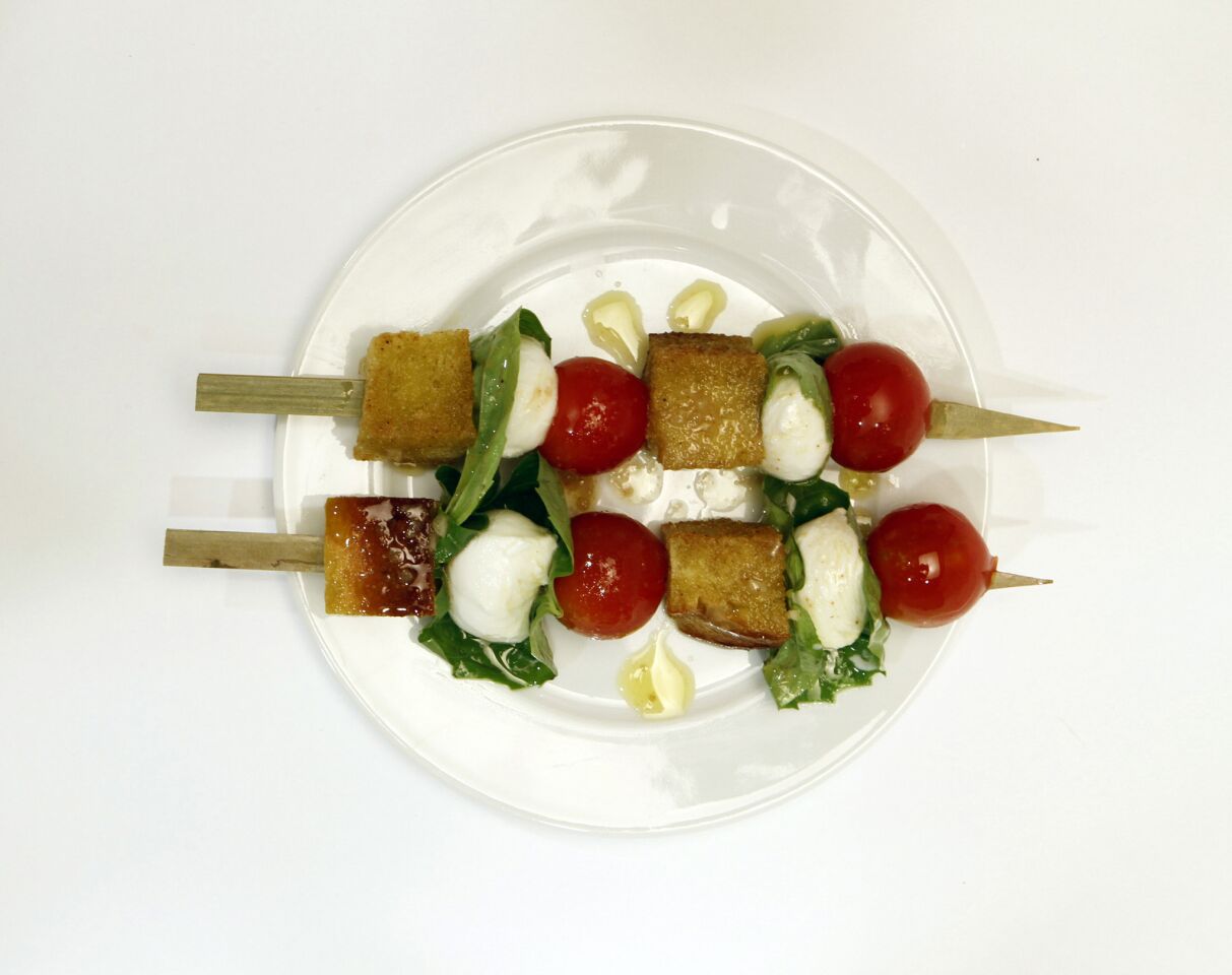 For something on the lighter side, these bread salad skewers with sherry vinaigrette from Matt Armendariz are bright, colorful and oh-so-flavorful.