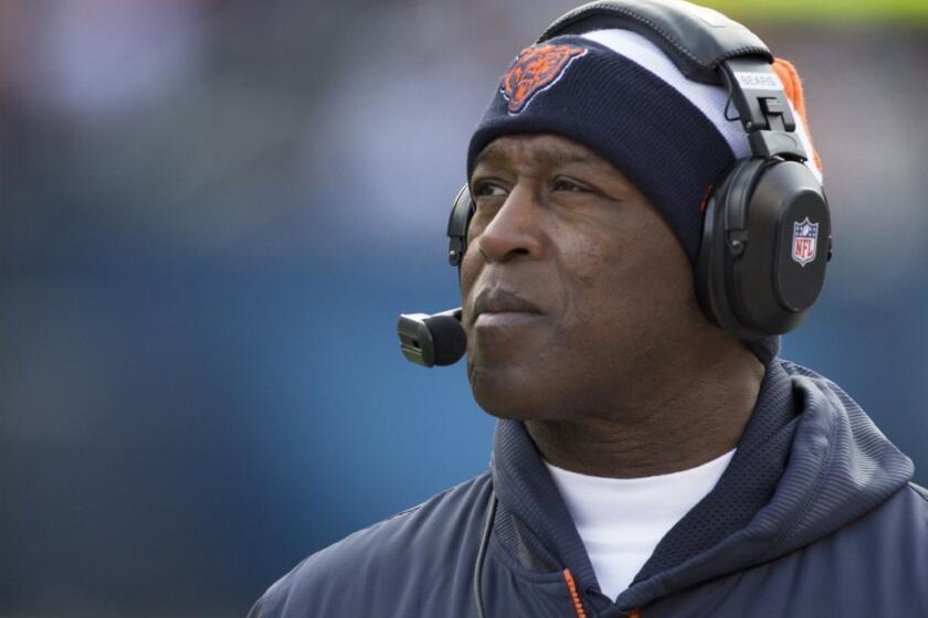 Lovie Smith is out as coach of the Bears.