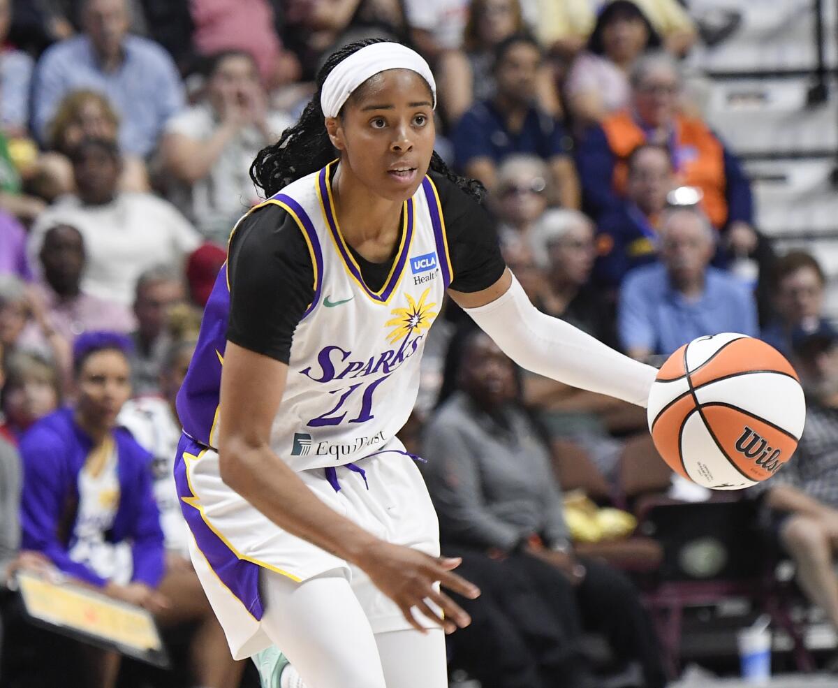 Sparks guard Jordin Canada controls the ball during a 90-76 loss to the Connecticut Sun on Tuesday.