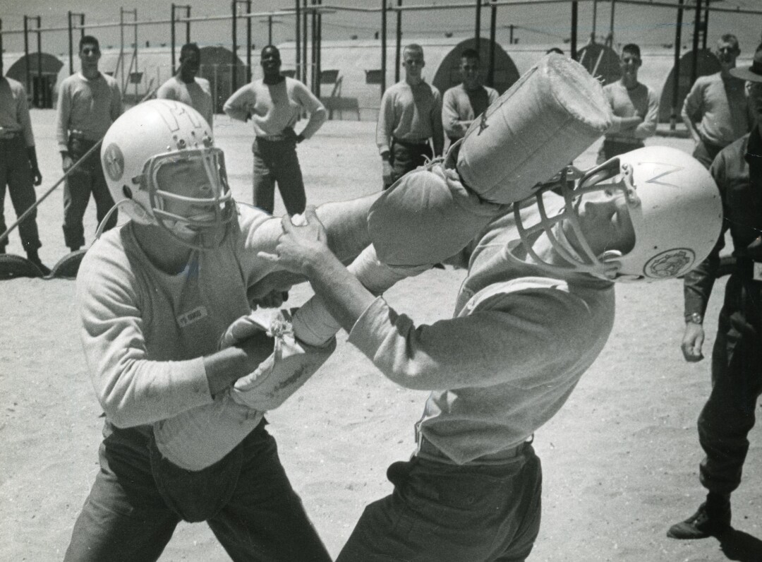 Recruits at the Marine Corps Recruit Depot practice pugil stick fighting in 1976