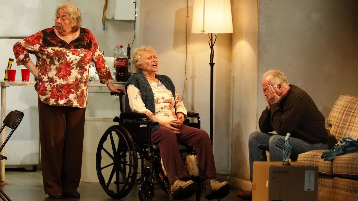 Jayne Houdyshell as Deirdre, left, with Lauren Klein as "Momo" and Reed Birney as Erik in "The Humans" at the Ahmanson.