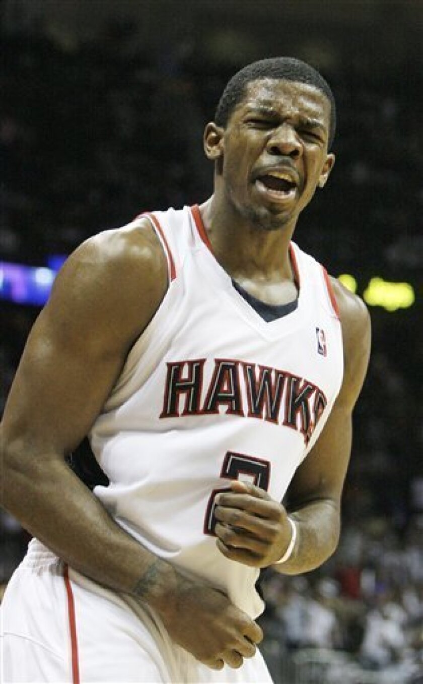 Atlanta Hawks' Joe Johnson reacts after hitting a three-point basket in the second quarter of Game 7 of the Eastern Conference NBA basketball playoff series against the Miami Heat, Sunday, May 3, 2009. (AP Photo/John Bazemore)