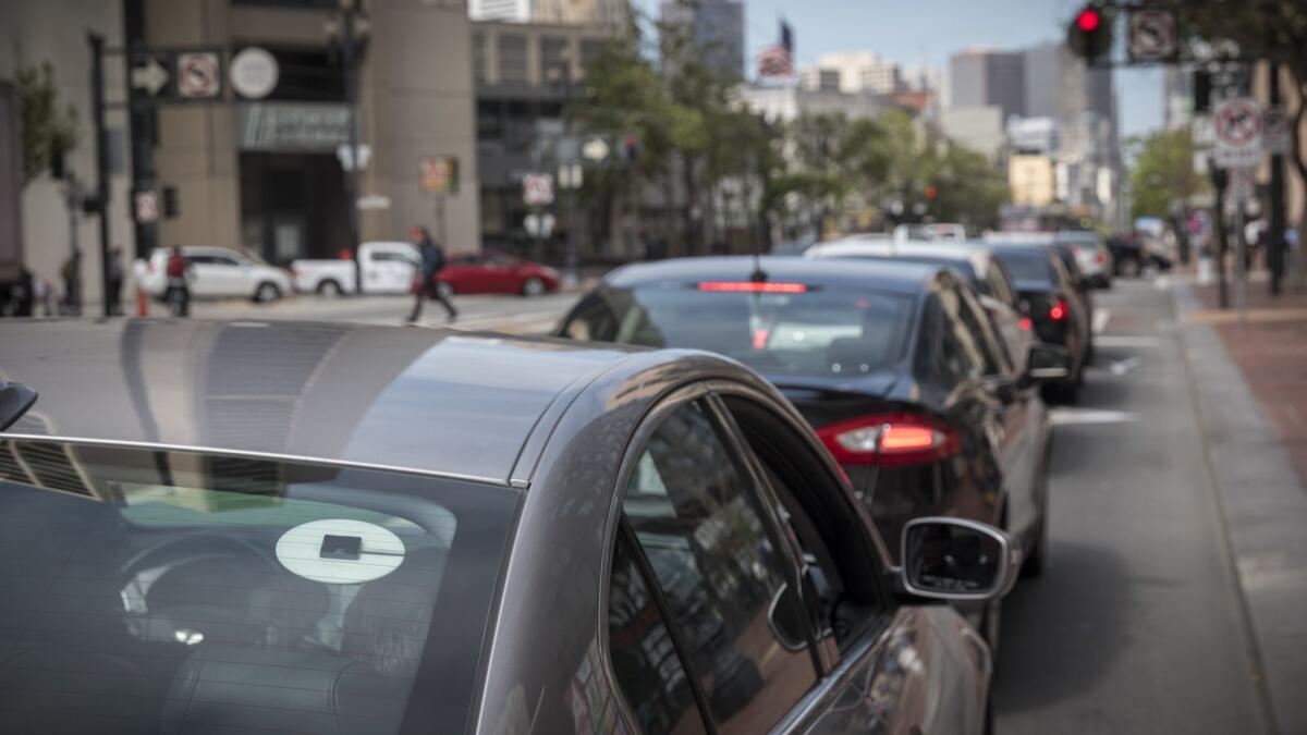 Uber cars are ubiquitous in San Francisco, home of the company's corporate headquarters on Market Street in the downtown area.