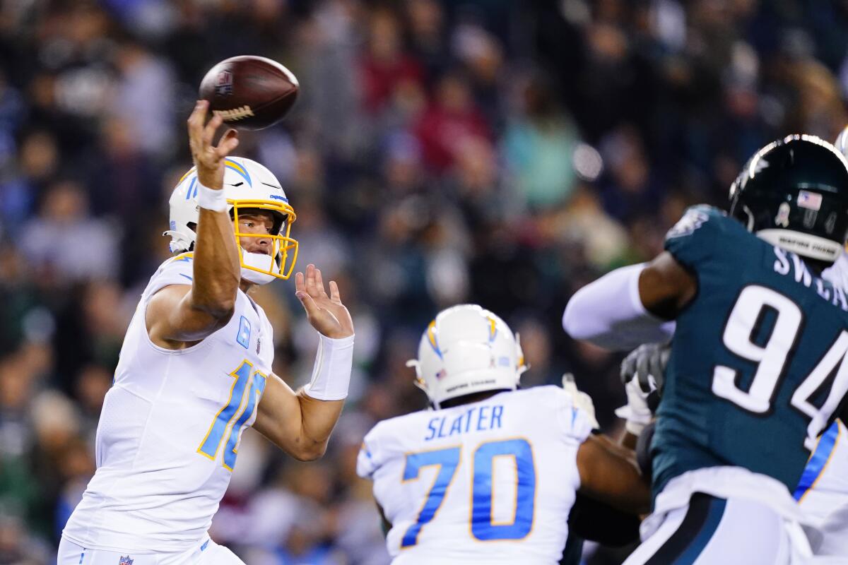 Chargers quarterback Justin Herbert passes against the Eagles.