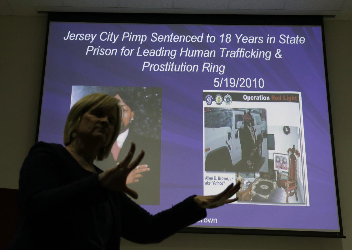 Kathleen Friess gives a presentation on human trafficking in Hamilton Township, N.J., for hotel and nightclub employees. Officials trained legions of law enforcement personnel, hospitality workers, high school students and airport employees to watch for signs of prostitution before the Sunday football game, when hundreds of thousands of people were expected to descend on New Jersey.