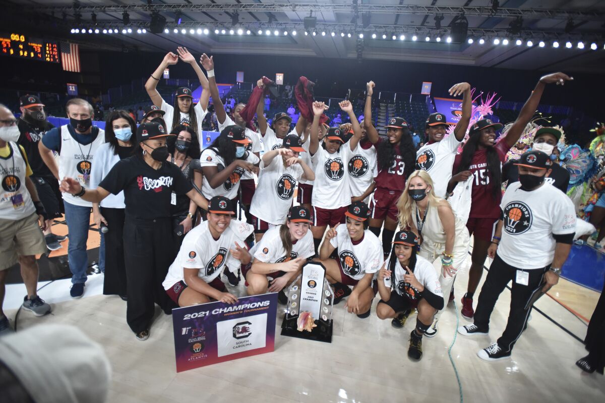 South Carolina women's basketball team celebrates after defeating UConn.