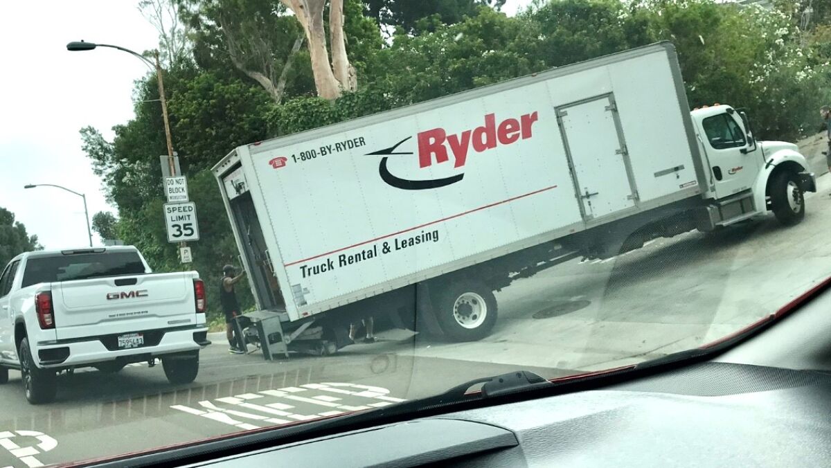 Reader Urs Baumann sent this photo of a truck that got stuck heading up Hillside Drive from Torrey Pines Road on July 28.