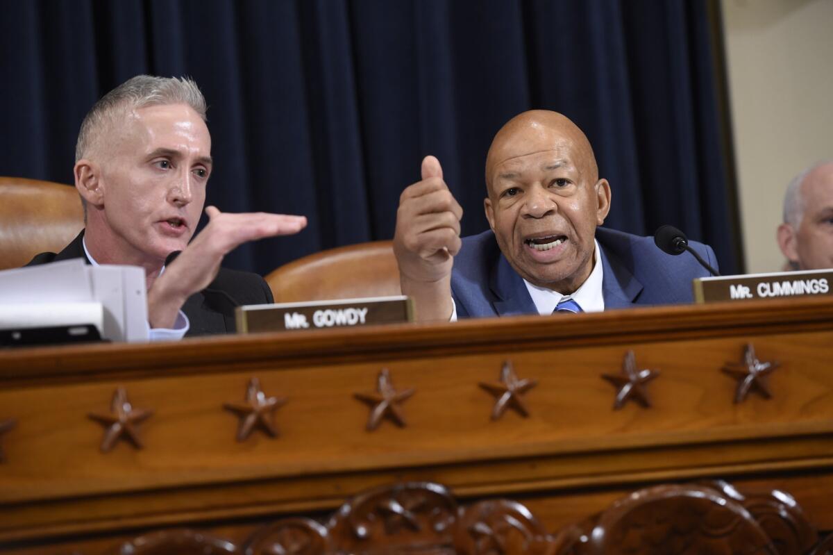 Republican US Representative from South Carolina Trey Gowdy (L) argues with Democratic US Representative Elijah Cummings during questioning of former US Secretary of State and Democratic Presidential hopeful Hillary Clinton as she testifies before the House Select Committee on Benghazi on Capitol Hill in Washington, DC, October 22, 2015. AFP PHOTO / SAUL LOEBSAUL LOEB/AFP/Getty Images ** OUTS - ELSENT, FPG, CM - OUTS * NM, PH, VA if sourced by CT, LA or MoD **