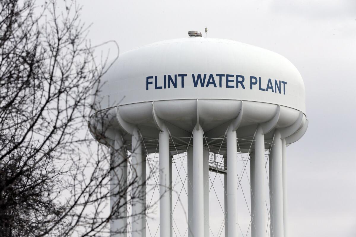 The Flint Water Plant tower, shown on Feb. 5, has become a symbol of the Michigan city's woes.