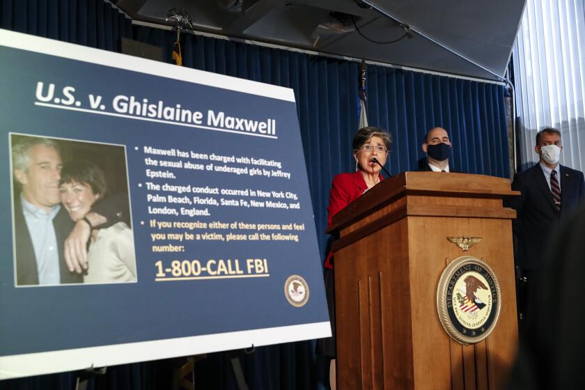 Audrey Strauss, Acting United States Attorney for the Southern District of New York, center, speaks alongside William F. Sweeney Jr., Assistant Director-in-Charge of the New York Office of the Federal Bureau of Investigation, center right, and New York City Police Commissioner Dermot Shea, right, during a news conference to announce charges against Ghislaine Maxwell for her alleged role in the sexual exploitation and abuse of multiple minor girls by Jeffrey Epstein, Thursday, July 2, 2020, in New York. (AP Photo/John Minchillo)