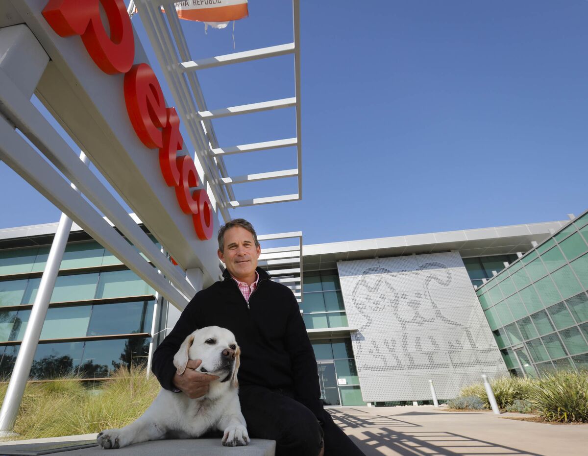 Ron Coughlin, Petco CEO, with his dog, Yummy