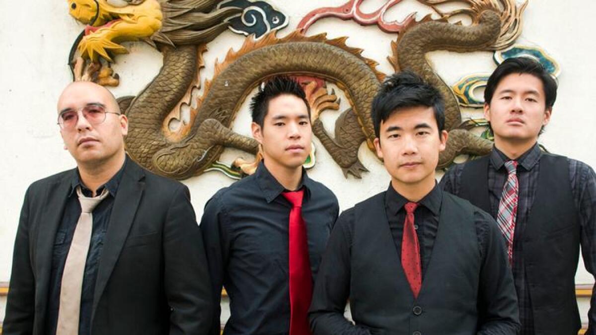 Members of the band the Slants.