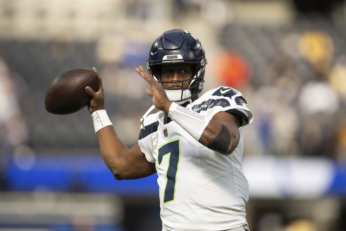 Seattle Seahawks quarterback Geno Smith (7) warms up before a game.