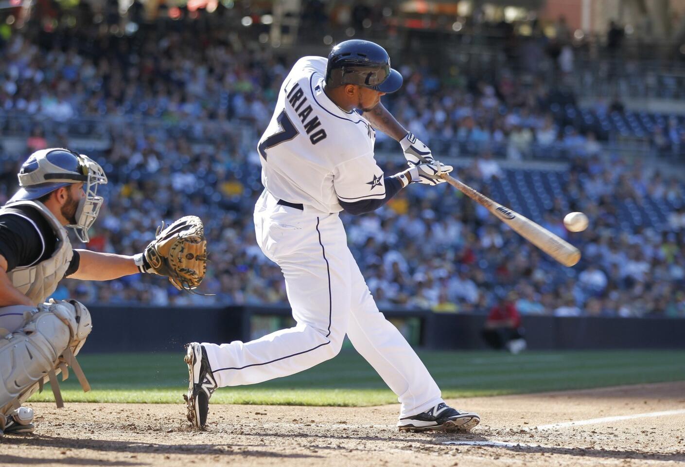The Padres' Rymer Liriano hits a two run home run in the fourth inning. The Padres beat the Rockies 5-3 at Petco Park on Wednesday, August 13, 2014.