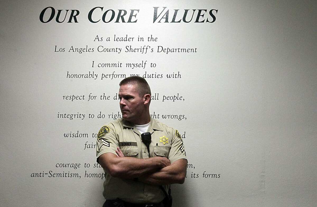 The Sheriff's Department's "Core Values" are painted on the wall at the jail.
