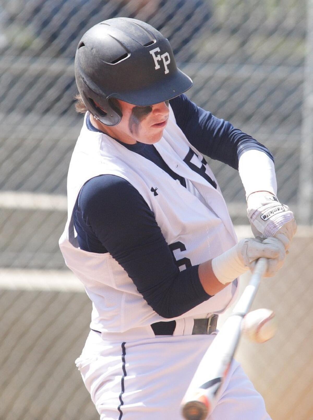 Flintridge Prep's Robbie Leslie connects during the Rebels' resounding playoff win.
