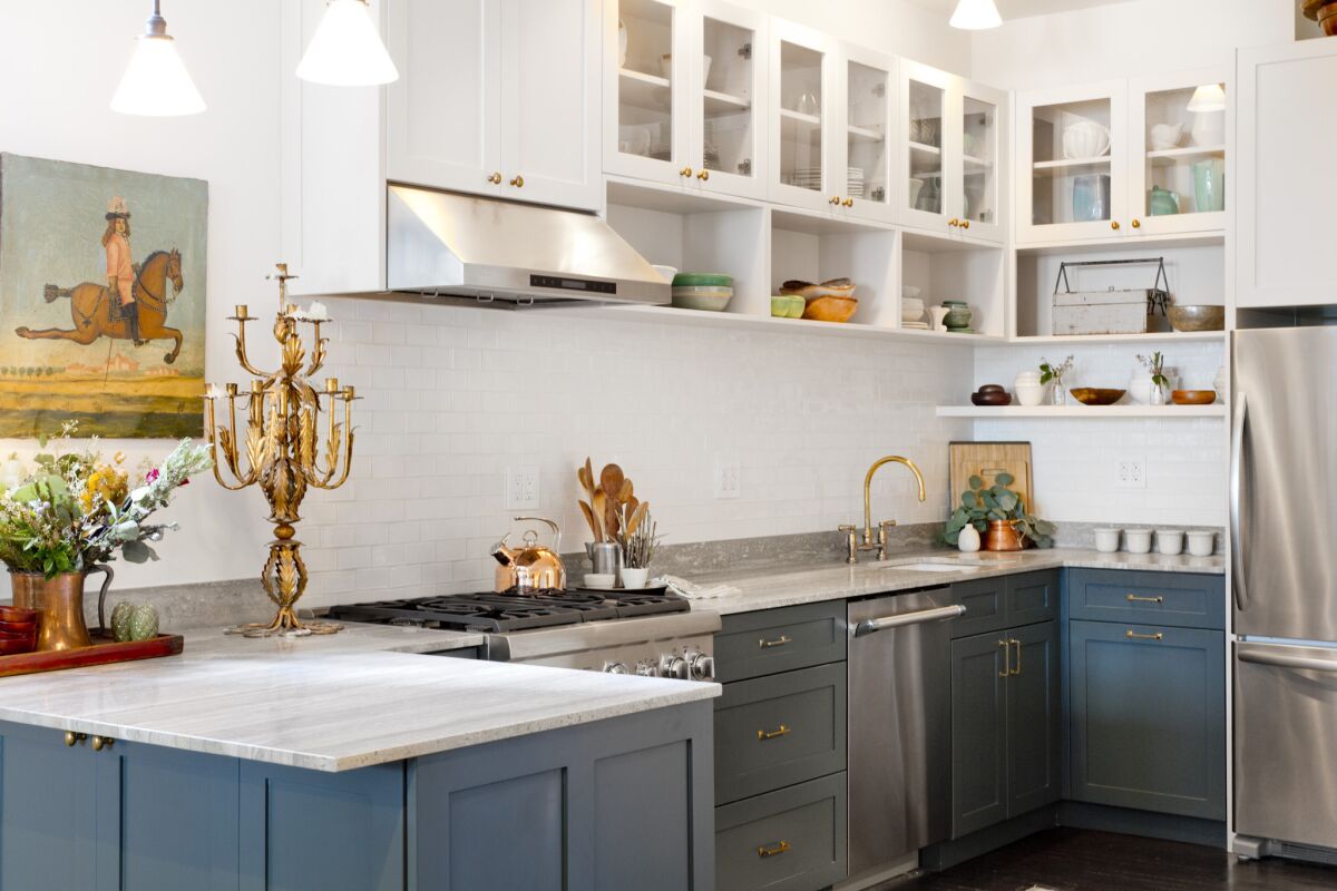 Houzz reports that themes for the kitchen will include mixed metal finishes and increasing use of color on cabinets — especially blue.