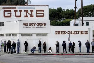 FILE - In this March 15, 2020 file photo people wait in a line to enter a gun store in Culver City, Calif. The man who shot and killed four people this week at a Tulsa, Okla., hospital bought his AR-style semiautomatic rifle just hours before he began the killing spree. That would not have been possible in Washington and a half dozen other states that have waiting periods of days or even more than a week before people can take possession of such weapons. (AP Photo/Ringo H.W. Chiu, File)