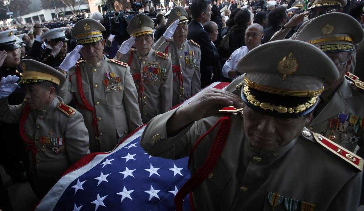 Thousands of Hmong gathered in Fresno in 2011 for the funeral of Gen. Vang Pao, who led guerrilla fighters in the CIA's secret campaign in Laos during the Vietnam War. Hmong veterans are seeking the right to be buried in national cemeteries.