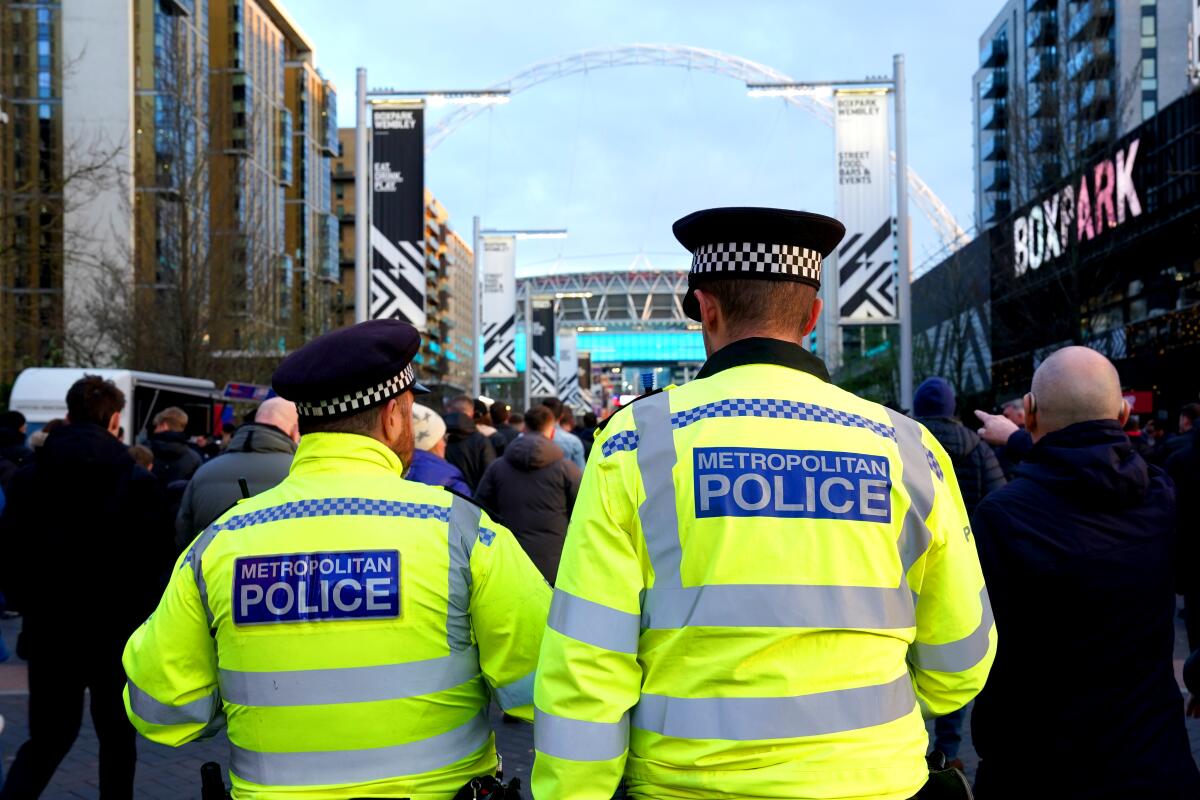 Police on Wembley Way ahead of a match at Wembley Stadium, London. 
