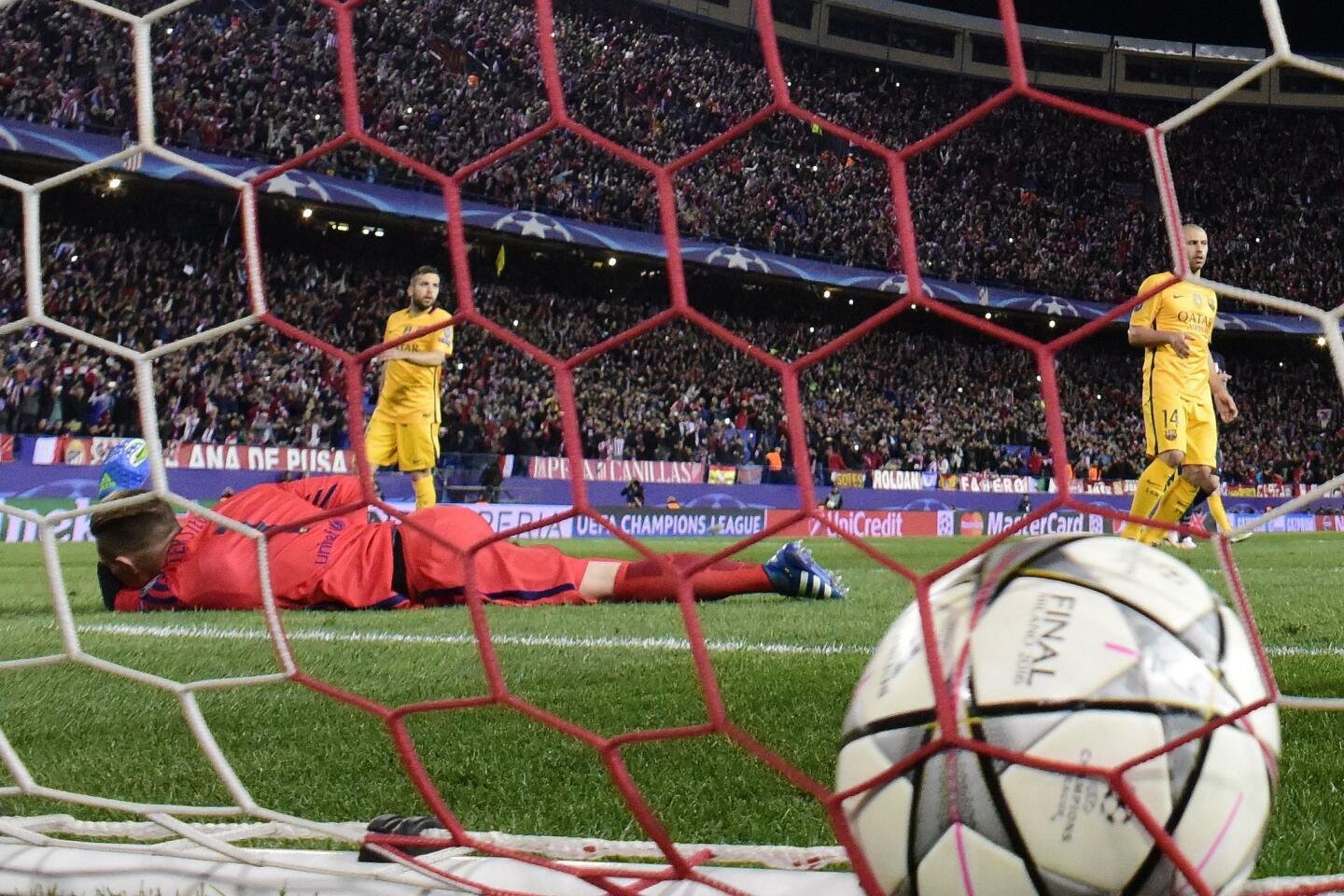 Barcelona's German goalkeeper Marc-Andre Ter Stegen lies on the field after a goal by Atletico Madrid's French forward Antoine Griezmann during the Champions League quarter-final second leg football match Club Atletico de Madrid vs FC Barcelona at the Vicente Calderon stadium in Madrid on April 13, 2016. / AFP PHOTO / JAVIER SORIANOJAVIER SORIANO/AFP/Getty Images ** OUTS - ELSENT, FPG, CM - OUTS * NM, PH, VA if sourced by CT, LA or MoD **