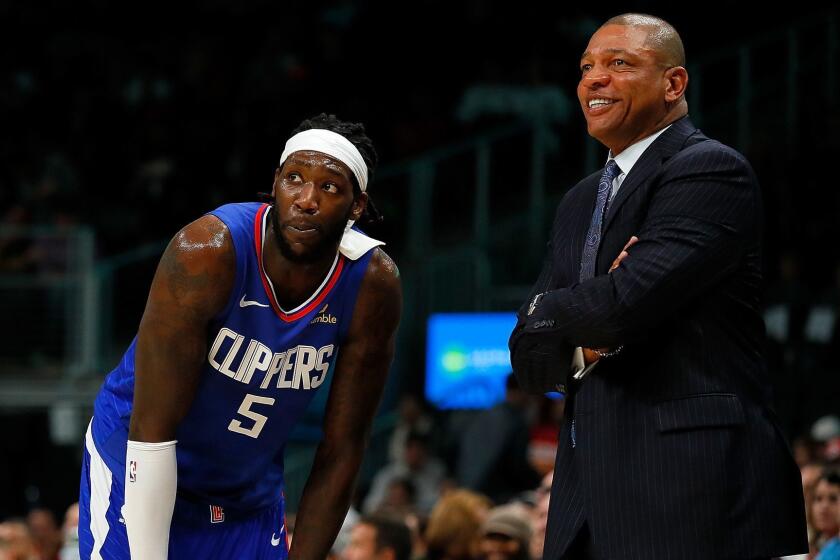 ATLANTA, GA - NOVEMBER 19: Montrezl Harrell #5 and Doc Rivers of the LA Clippers converse against the Atlanta Hawks at State Farm Arena on November 19, 2018 in Atlanta, Georgia. NOTE TO USER: User expressly acknowledges and agrees that, by downloading and or using this photograph, User is consenting to the terms and conditions of the Getty Images License Agreement. (Photo by Kevin C. Cox/Getty Images) ** OUTS - ELSENT, FPG, CM - OUTS * NM, PH, VA if sourced by CT, LA or MoD **