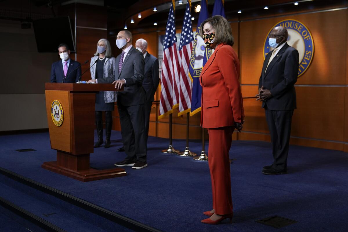 Democratic lawmakers at a news conference. 