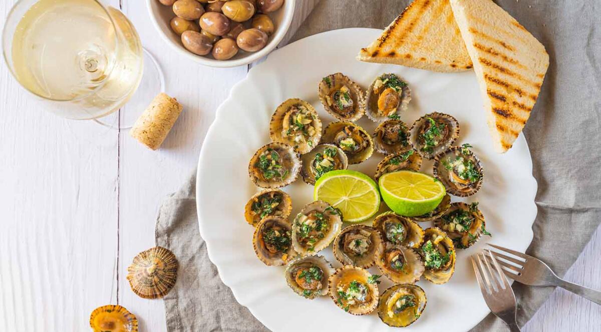 Patella, Limpets served with lime, a traditional seafood of Tenerife and Madeira Islands.