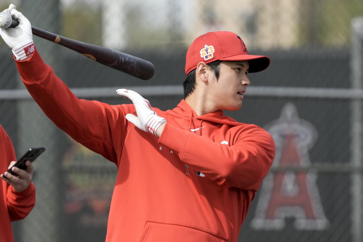 Los Angeles Angels' Shohei Ohtani bats during a spring training baseball workout Friday.