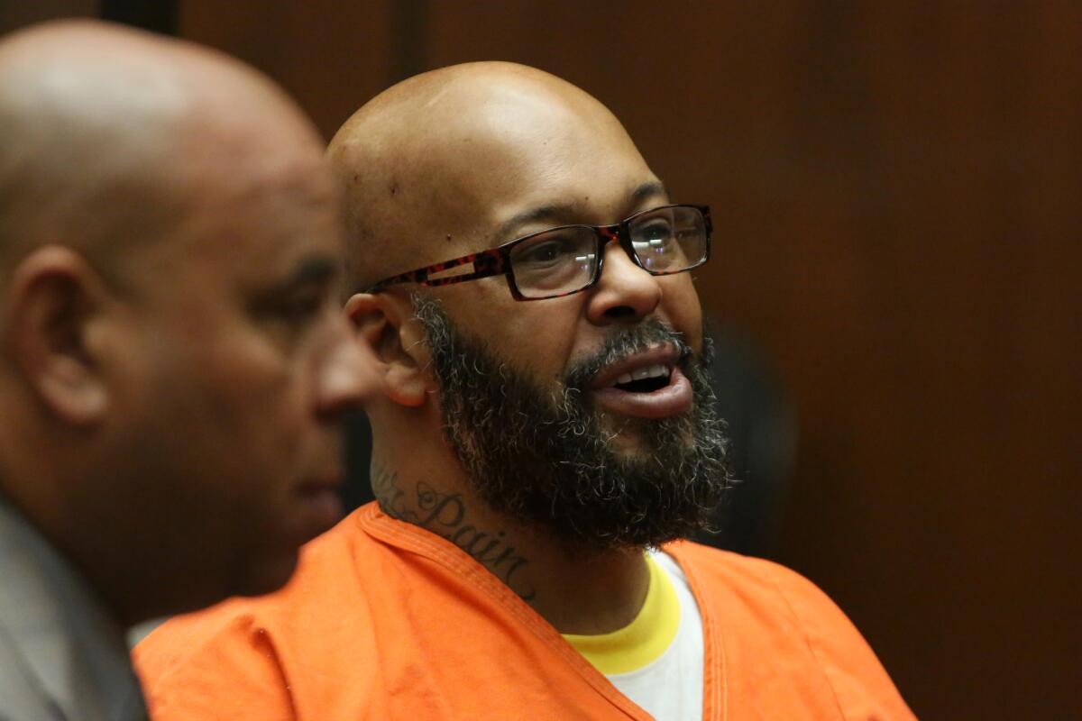 Former rap mogul Marion "Suge" Knight is shown with his attorney Matthew Fletcher in a Los Angeles County courtroom April 8.