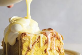 A tres leches-style bread pudding is drizzled with condensed milk.