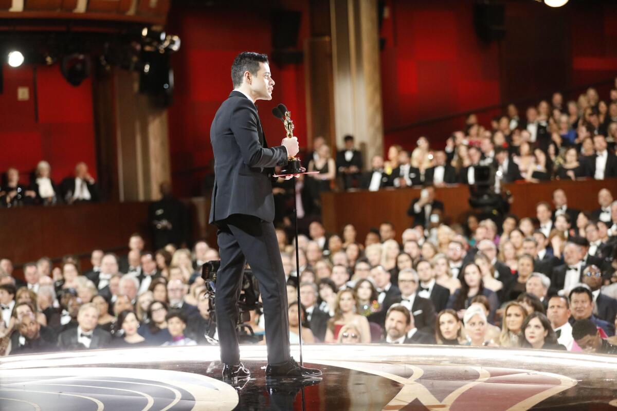 Rami Malek accepts his lead actor Oscar for portraying Queen frontman Freddie Mercury in "Bohemian Rhapsody" at the 91st Academy Awards.