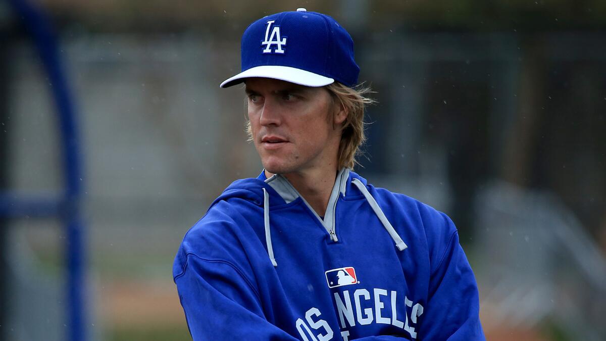 Dodgers starting pitcher Zack Greinke looks on during a spring training workout session in Glendale, Ariz., on March 2.