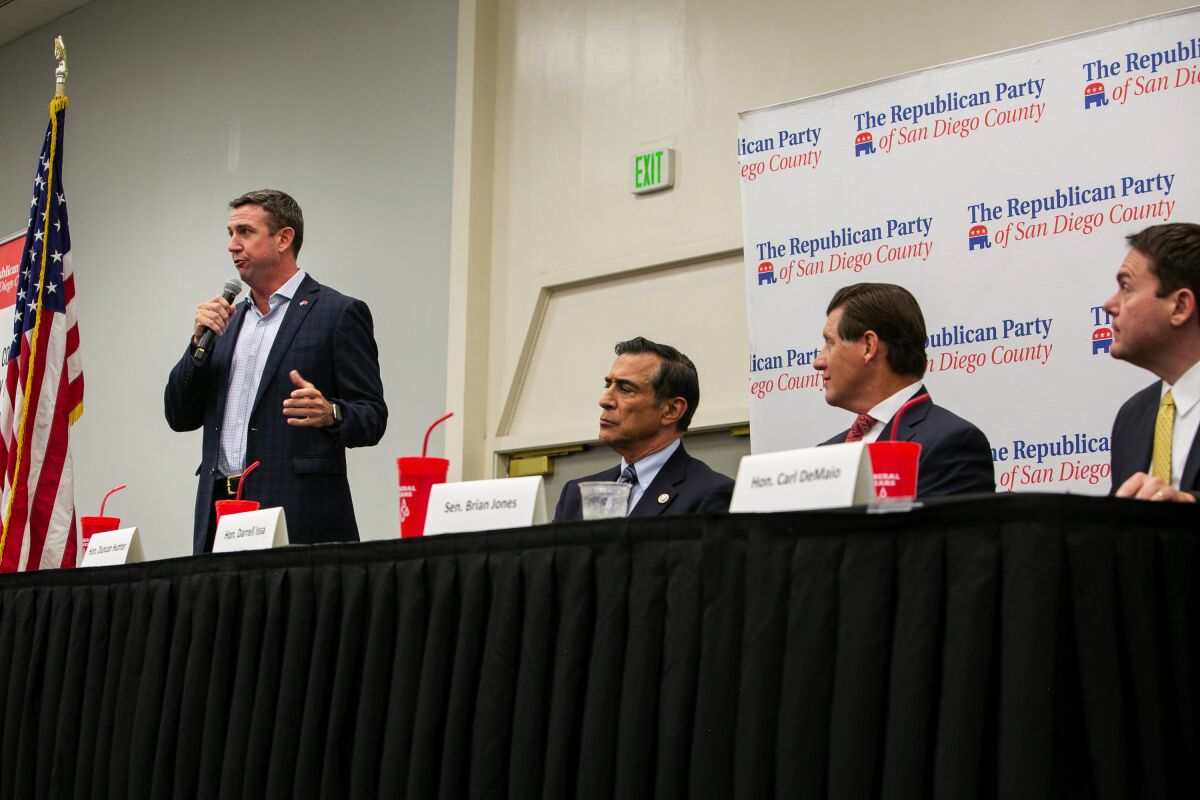Republican candidates for the 50th Congressional District, incumbent Duncan Hunter (left), former Congressman Darrell Issa, state Sen. Brian Jones and former San Diego city councilman Carl DeMaio take part in the Republican Party of San Diego County’s forum on Monday.