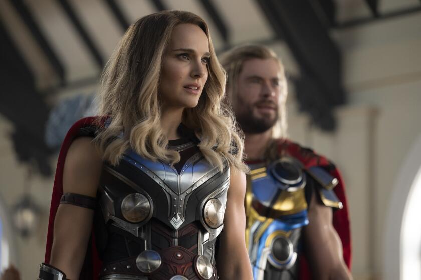 From left, Natalie Portman as Mighty Thor and Chris Hemsworth as Thor in Marvel Studios' "Thor: Love and Thunder."