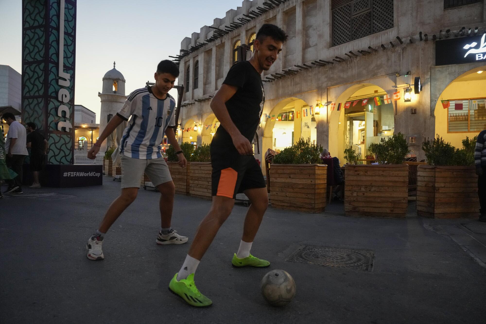 People play soccer at Souq 