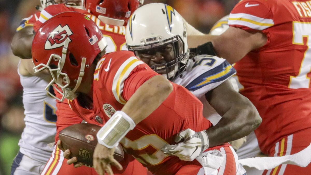 Chargers linebacker Melvin Ingram sacks Chiefs quarterback Patrick Mahomes on Dec. 13 at Arrowhead Stadium.