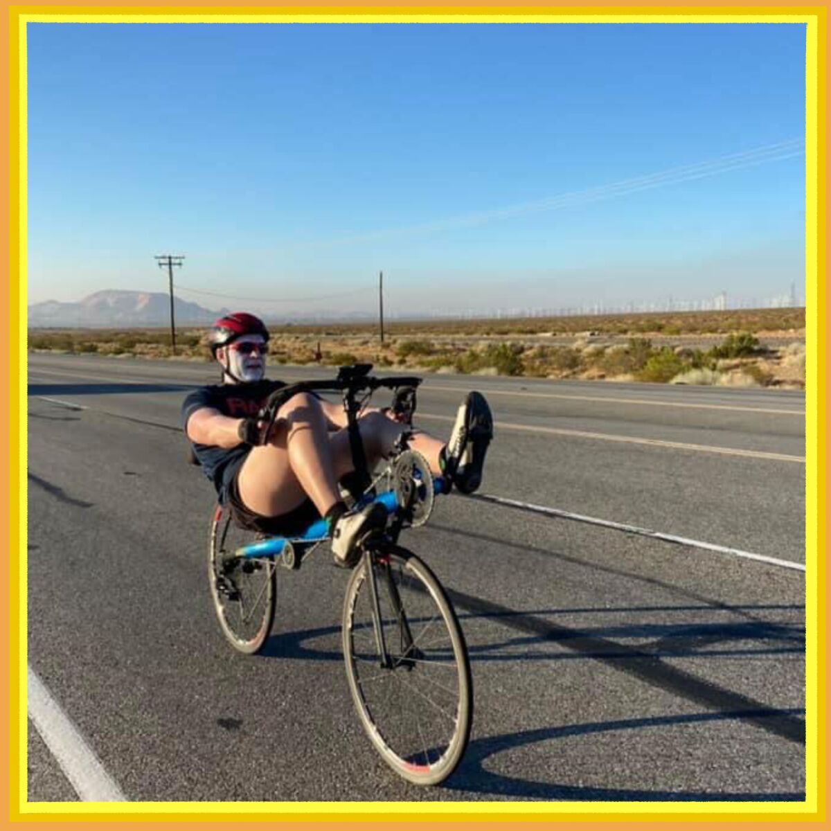 Rob DeCou rides a recumbent bicycle in the 2020 Uberman Ultra-Triathlon.