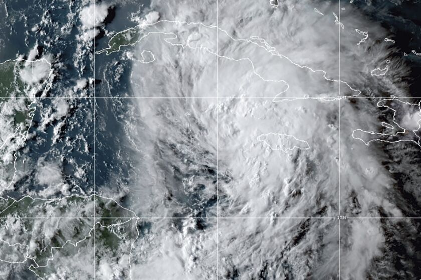 This OES-16 East GeoColor satellite image taken Thursday, Aug. 26, 2021, at 10:20 p.m. EDT, and provided by NOAA, shows Tropical Storm Ida in the Caribbean Sea. Tropical Storm Ida formed in the Caribbean on Thursday and forecasters said its track was aimed at the U.S. Gulf Coast, prompting Louisiana's governor to declare a state of emergency and forecasters to announce a hurricane watch for New Orleans. (NOAA via AP)