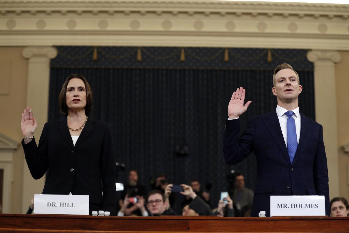 Fiona Hill and David Homes sworn in to testify