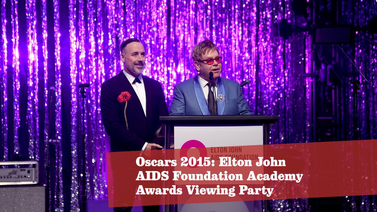 Musician and host Elton John, right, and husband David Furnish. More Oscars: Full coverage | Complete list | Show highlights | Red carpet | Quotes from the stars | Backstage | Top nominees | Q&As with the contenders