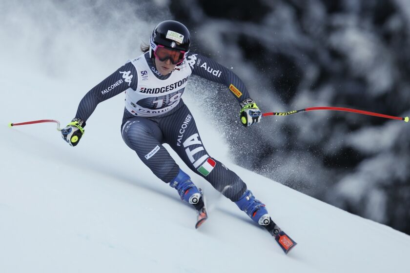 FLE - Elena Fanchini speeds down the course during an alpine ski, women's World Cup downhill, in Garmisch-Panterkirchen, Germany, on Jan. 21, 2017. Italian skier Elena Fanchini, whose career was cut short by a tumor, has died. She was 37. Fanchini passed away Wednesday at her home in Solato, near Brescia, the Italian Winter Sports Federation announced. Fanchini died on the same day that fellow Italian Marta Bassino won the super-G at the world championships in Meribel, France; and two days after Federica Brignone – another former teammate – claimed gold in combined. (AP Photo/Marco Trovati, File)