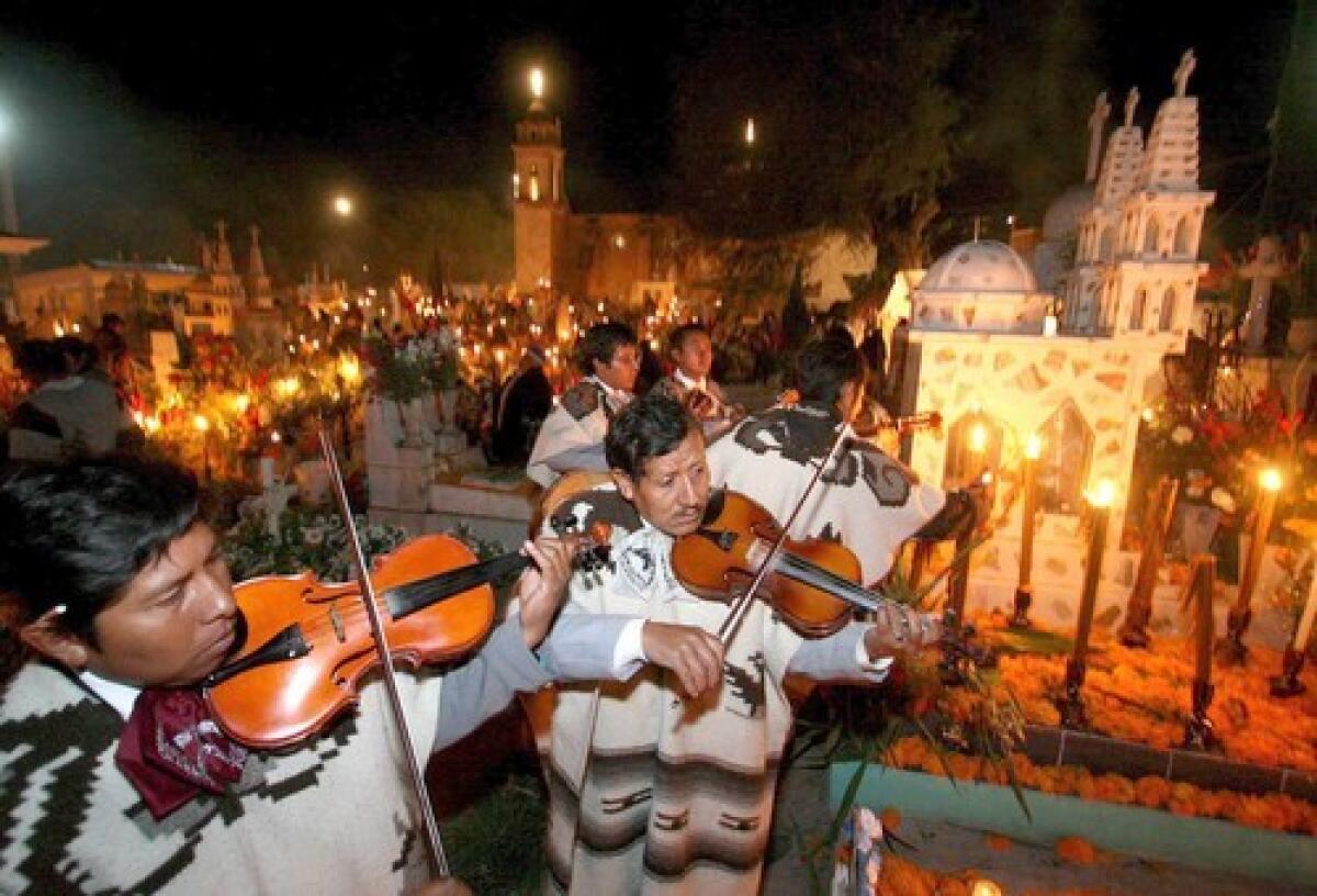 AUTHENTIC: Mariachis celebrate the Day of the Dead in Puebla, a historic Mexican city with a baroque feel.