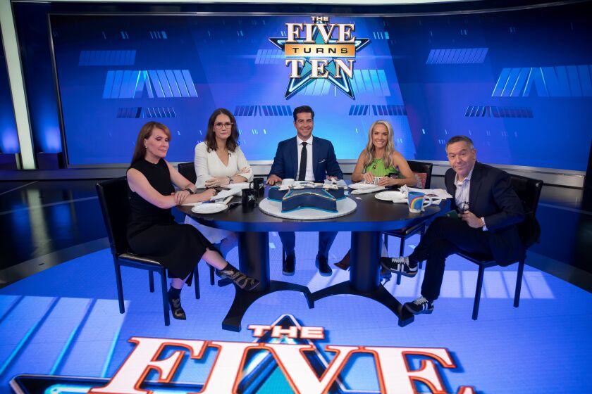 NEW YORK, NY - JULY 09, 2021: Dagen McDowell left, and Jessica Tarlov, second from left, both guest hosts and Fox News co-hosts of 'The Five,' Jesse Watters, center, Dana Perino, second from right, and Greg Gutfeld, right, pose for a photo on the set of the program at Fox News headquarters on July 09, 2021 in New York City. (PHOTOGRAPH BY MICHAEL NAGLE / FOR THE TIMES)